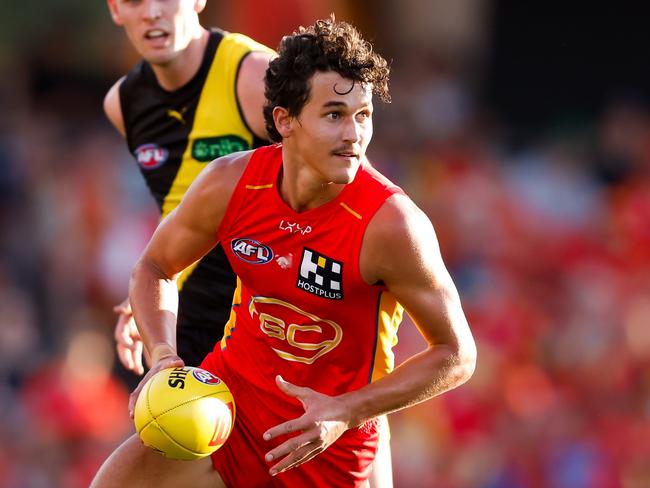 GOLD COAST, AUSTRALIA - MARCH 09: Wil Powell of the Suns in action during the 2024 AFL Opening Round match between the Gold Coast SUNS and the Richmond Tigers at People First Stadium on March 09, 2024 in Gold Coast, Australia. (Photo by Dylan Burns/AFL Photos via Getty Images)