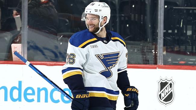 PHILADELPHIA, PENNSYLVANIA - MARCH 04: Nathan Walker #26 of the St. Louis Blues (L) reacts after defeating the Philadelphia Flyers at the Wells Fargo Center on March 04, 2024 in Philadelphia, Pennsylvania. (Photo by Tim Nwachukwu/Getty Images)