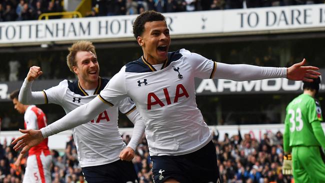 Tottenham Hotspur's English midfielder Dele Alli celebrates.