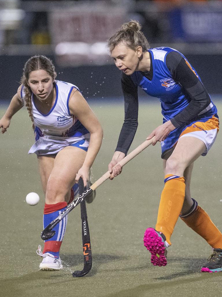 Tannah Hood for Rangeville and Alex Young for Newtown. A1 Women , Toowoomba Hockey grand final. Newtown vs Rangeville. Saturday, September 10, 2022. Picture: Nev Madsen.