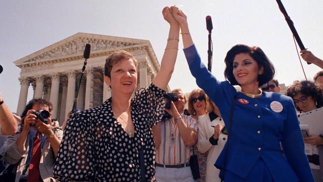 Norma McCorvey - Jane Roe in the 1973 court case - and her lawyer Gloria Allred, right, in 1989. Picture: AP