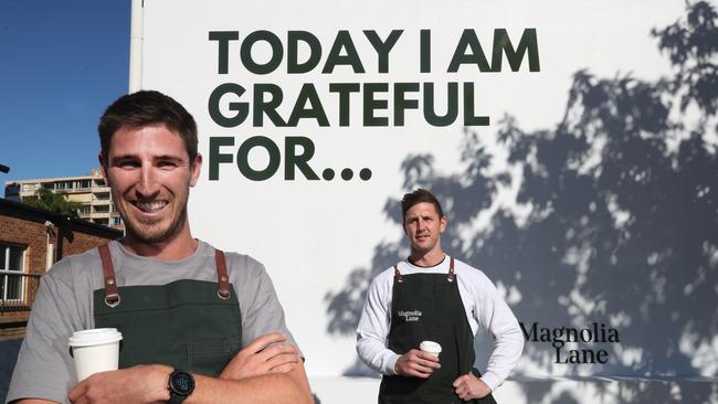 Magnolia Lane owners Mitch Ryan and Anthony Bartolo, still smiling despite Covid spoiling the opening weeks of their new cafe in the heart of Burleigh. Picture Glenn Hampson