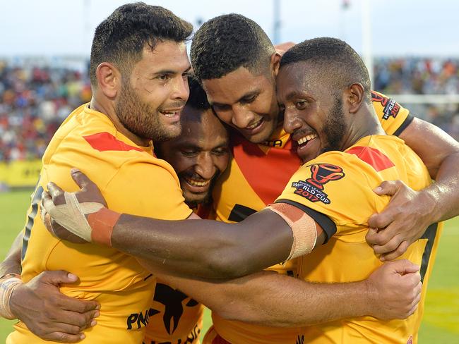 Nene McDonald (second right) says the PNG team is tight. Picture: Getty Images