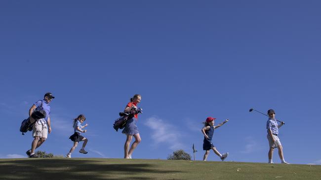 David Cooper (right) with parents Yulia Petrenko and Nick Cooper and sisters Morgan and Samantha. Picture: Brett Hartwig