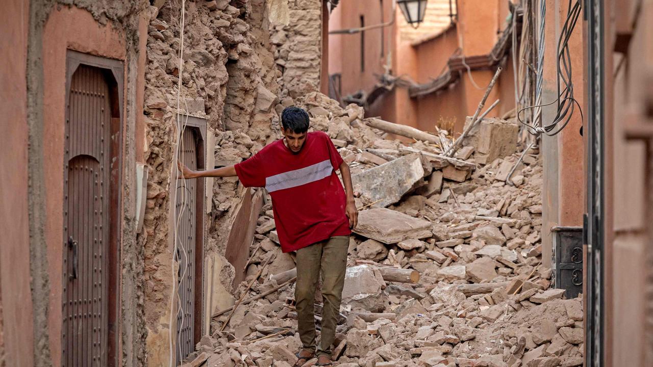 A resident navigates through the rubble following a 6.8-magnitude quake in Marrakesh on September 9, 2023. Picture: FADEL SENNA / AFP