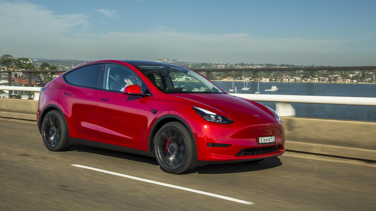 Red tesla deals model y performance