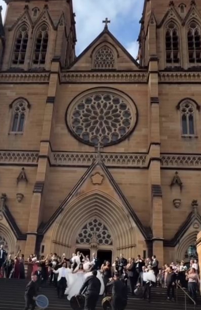 Their guests cheered them on as drums beat on the forecourt of the iconic cathedral. Picture: Instagram