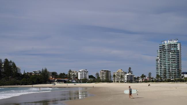 An empty Coolangatta beach on the Queensland-New South Wales border, Friday, May 22, 2020. Businesses in the border town would normally be busy this time of year but are suffering due to the State enforced border closure in place since March. (AAP Image/Dave Hunt)