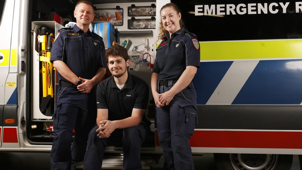 Harley Phipps with Chris Mullen intensive care paramedic and Brianna Batchelor paramedic who were part of the team from Ambulance Tasmania who gave medical assistance after the crash. Harley Phipps 20 is reunited with the members of Ambulance Tasmania who helped save him after a serious sidecar motorcycle crash. Picture: Nikki Davis-Jones