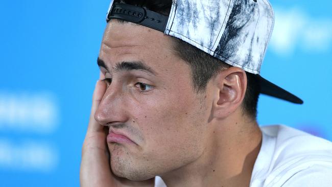 Bernard Tomic speaks after forfeiting his Sydney International quarter-final last year.