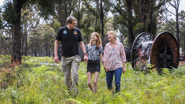 Mark and Cate Trellegas with daughter Jessica near their Mallacoota propert. Picture: Aaron Francis