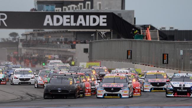 Best leads some of the biggest names in Australian motorsport through the first turn of race one of the OTR Supersprint at The Bend. Picture: Brenton Edwards