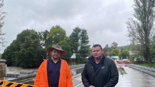 Mayor Matt Gould and state MP Nathaniel Smith on the ground at Picton as the SES prepare to close Stonequarry Creek Bridge in early March 2021. Picture: Annie Lewis