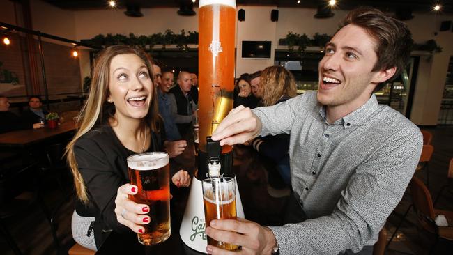 Katherine Kyriazis and Shaun Jarvie check out the new offering at Etihad Stadium. Picture: David Caird