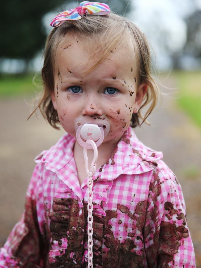 Rosie Galton looks a bit bemused by the mud. Picture: Peter Lorimer/AAP