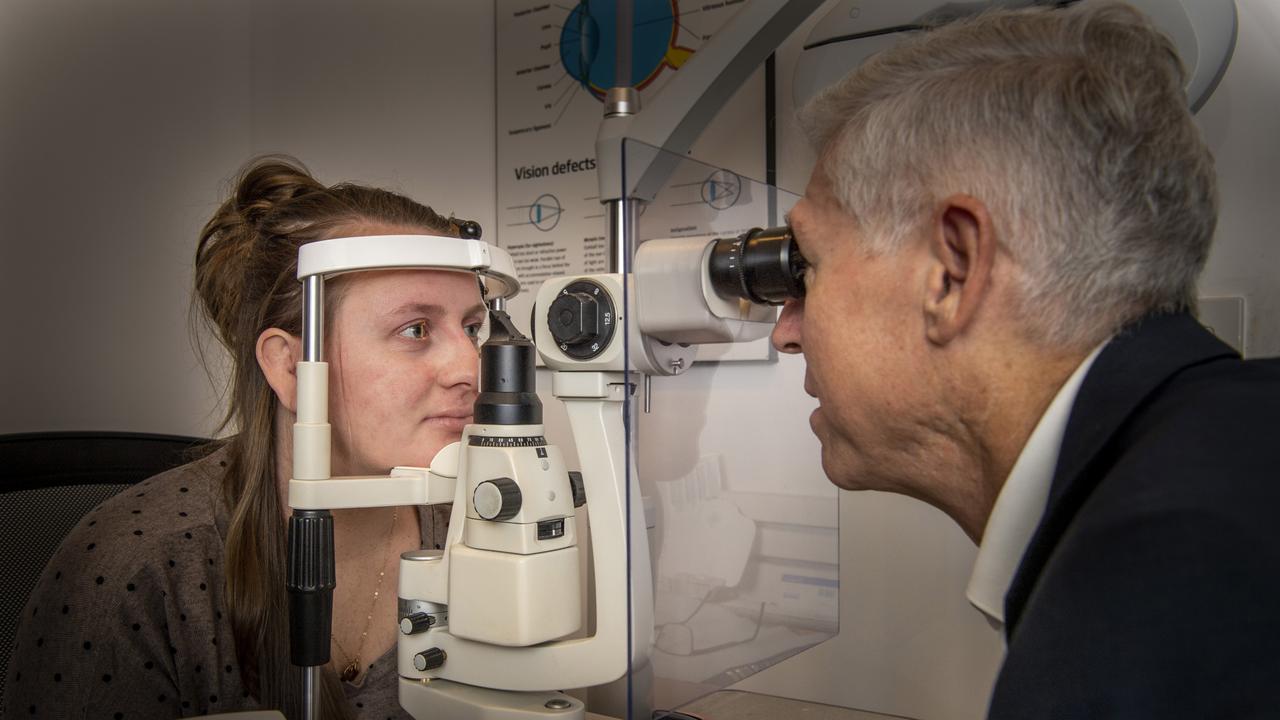 Sophia Rokoraite with Optometrist Steve Turley from Specsavers Toowoomba. Picture: Nev Madsen.