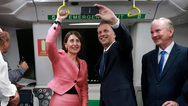  Premier Gladys Berejiklian, Transport Minister Andrew Constance and Riverstone MP Kevin Conolly (R) are the first to ride the Sydney Metro North West train due to open officially just after the state election this weekend. Picture: Toby Zerna