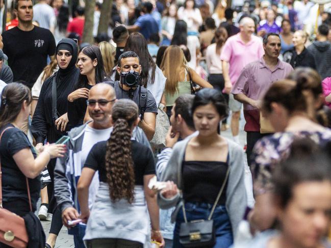 SYDNEY, AUSTRALIA - NewsWire Photos DECEMBER 13, 2020: Crowds of people are seen walking near the Myer city store in the lead up to Christmas. Picture: NCA NewsWire / Jenny Evans