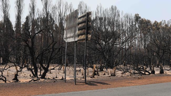 Fire damaged road sign on South Coast Road, Flinders Chase, after fire ripped through the Flinders Chase National Park on Friday the 4th of January 2020.(Photographer Emma Brasier)