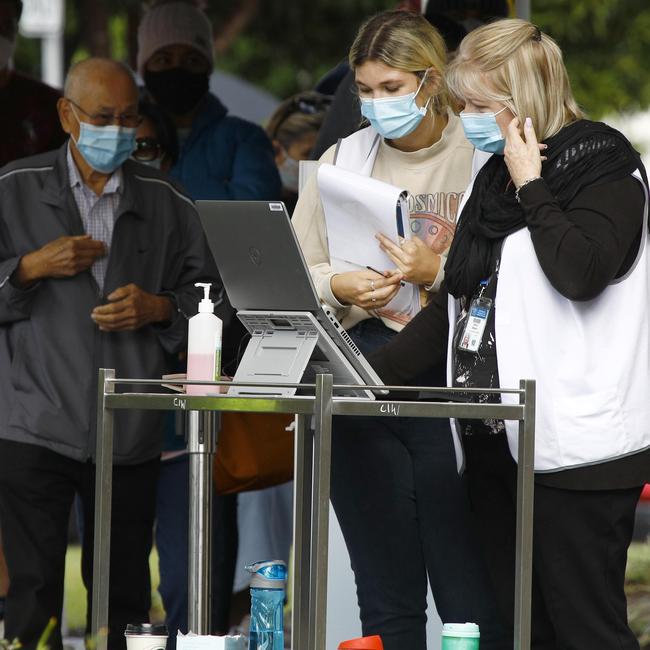 Day 2 in lockdown. Members of the public line up to get tested for Covid at the Albert Waterways Community centre. Picture: Tertius Pickard