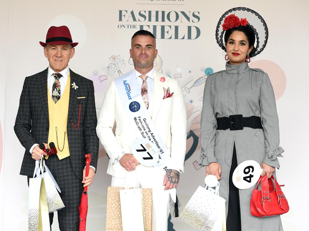 Michael Alpine, best suit winner Eric Grinham, and Ritu Kukreja at Fashions on the field at Geelong Cup. Picture: David Smith