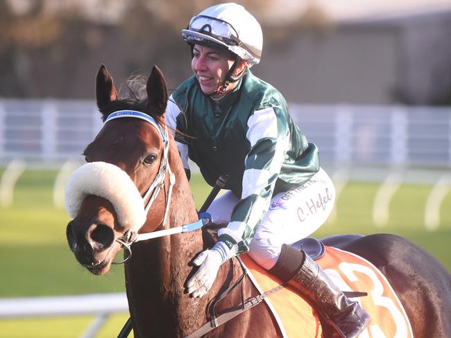 Carleen Hefel returns to the mounting yard on Sigh after winning the Neds Sir John Monash Stakes at Caulfield Racecourse on July 08, 2023 in Caulfield, Australia. (Photo by Reg Ryan/Racing Photos via Getty Images)