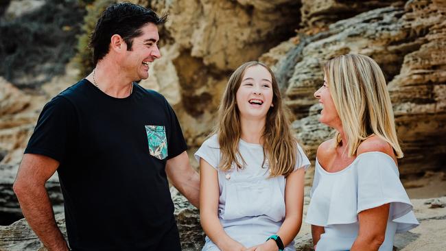 Clint and Fiona Benbow with their daughter Amber Jess Millar who was killed in a Broome chopper crash with Troy Thomas in July 2020.