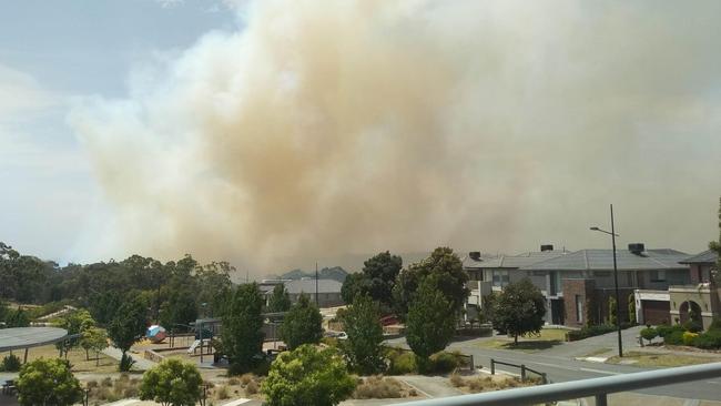 Thick smoke rises from a bushfire in the Plenty Gorge Parklands on December 30.