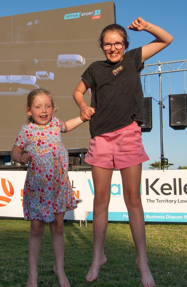 Aria Skinner and Indiana Skinner as thousands of fans gather to watch the Matildas take on England in the World Cup Semifinal at Darwin Waterfront. Picture: Pema Tamang Pakhrin