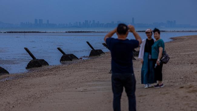 Low tide reveals lines of spikes set into the beaches, designed to pierce the hulls of amphibious landing craft, and broken glass has been set into the rocks above to lacerate the hands of any attackers who manage to get out of the boats