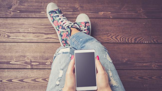 Generic photo of girl with a phone. Picture: iStock