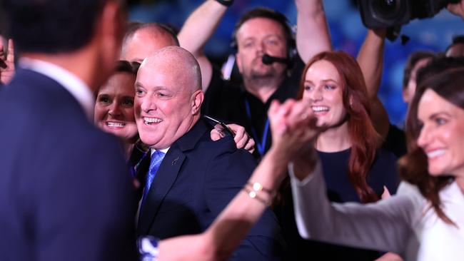 Christopher Luxon is mobbed as he arrives at the National party election celebration in Auckland on Saturday night. Picture: Getty Images