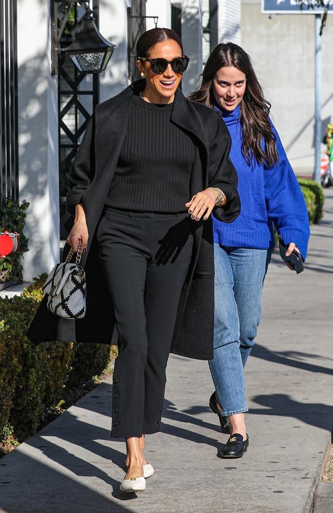 Meghan Markle was all smiles as she left Gracias Madre in West Hollywood after an International Women's Day celebration. Picture: MEGA / BACKGRID