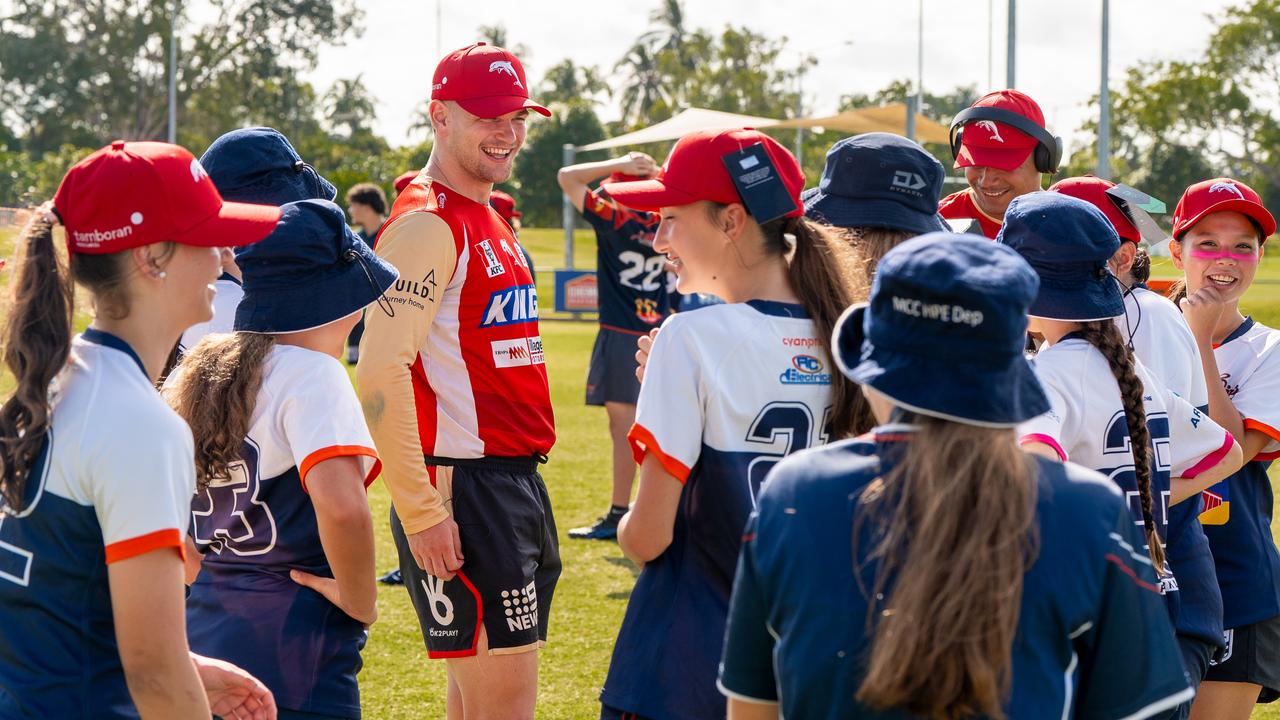 Oryn Keeley runs young fans through some drills at a schools competition. Picture: NT Major Events Company: Verity Griffin