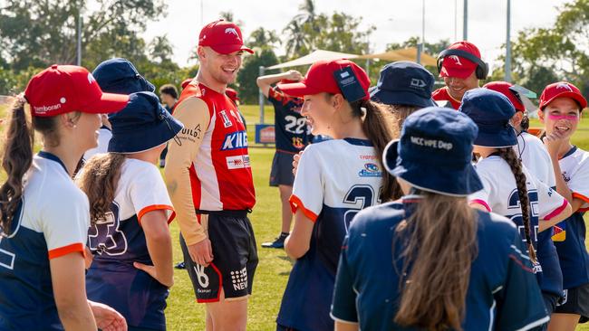 Oryn Keeley runs young fans through some drills at a schools competition. Picture: NT Major Events Company: Verity Griffin