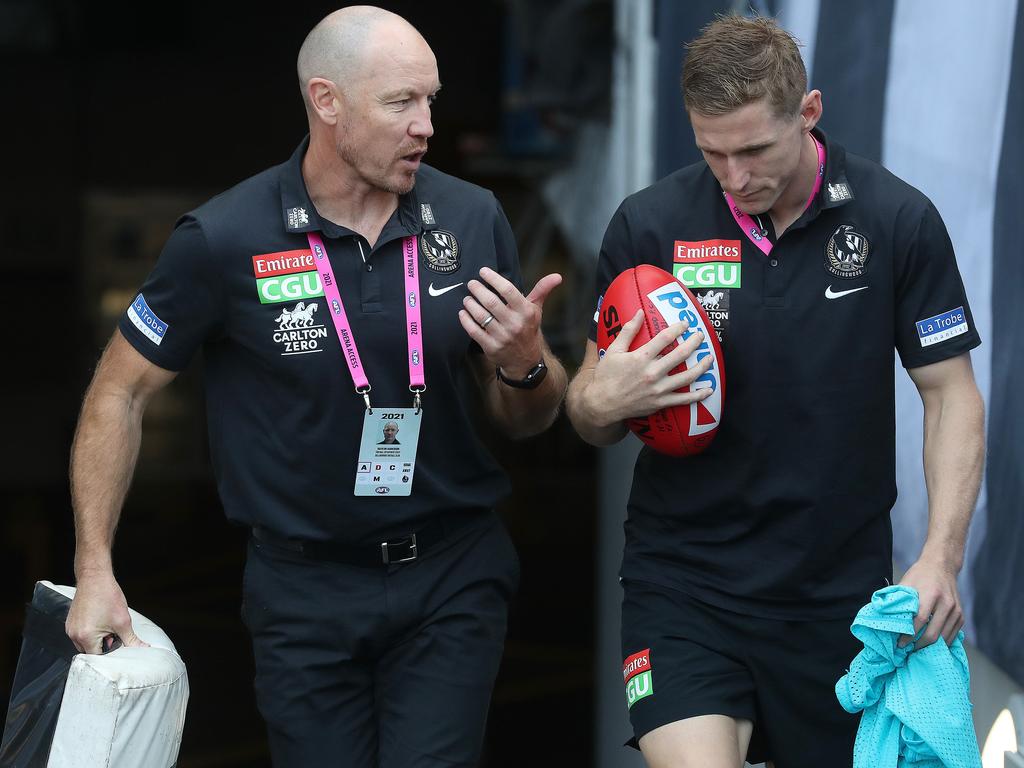 Sanderson with Collingwood assistant Scott Selwood. Picture: Michael Klein