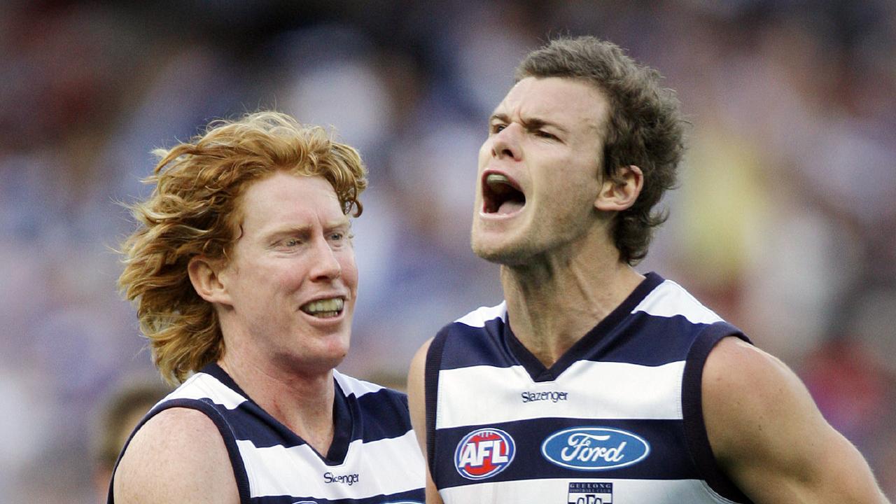 Mooney (right) was a two-time premiership player with Geelong.