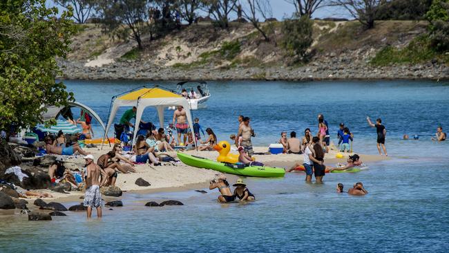 People cooling off at Echo Beach, Tallebudgera Creek during a hot summers day on the Gold Coast. Picture: Jerad Williams