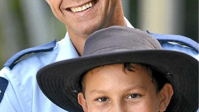 GRATEFUL: Sen Const Pierre Senekal with his cancer survivor son, Peter. Picture: Warren Lynam