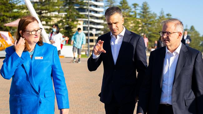 Labor candidate for Boothby, Louise Miller-Frost, Premier Peter Malinauskas, and Opposition Leader Anthony Albanese, walk together near the Glenelg jetty on April 7. Picture: NCA NewsWire / Morgan Sette