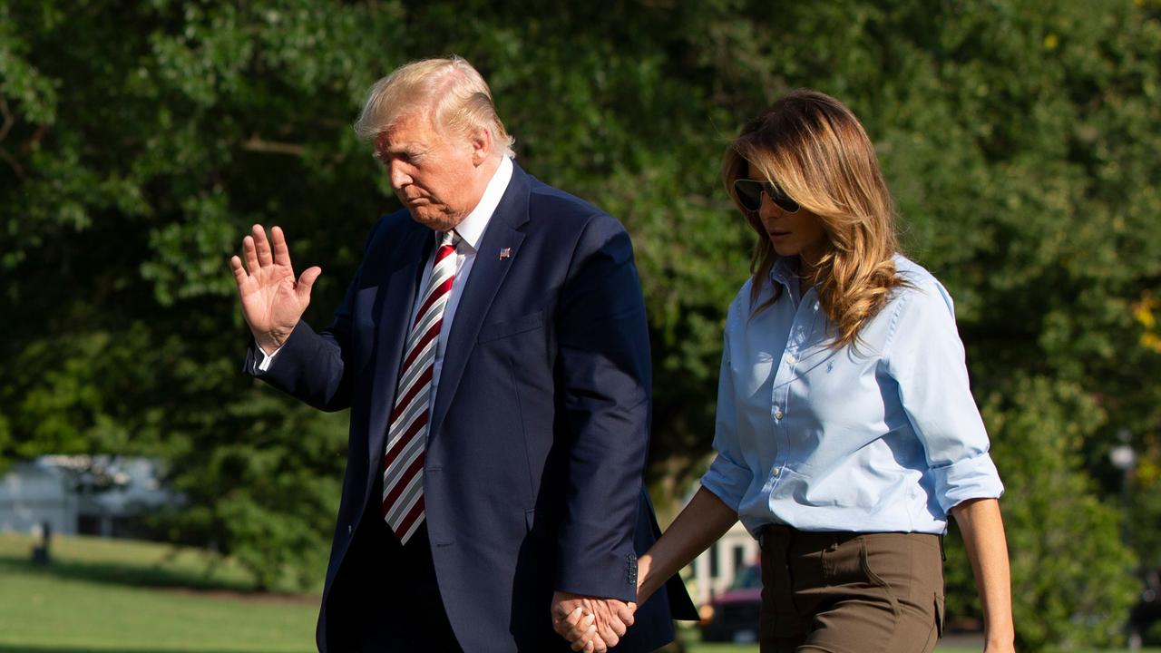 US President Donald Trump and First Lady Melania Trump return to the White House in Washington, DC. Picture: Alastair Pike / AFP