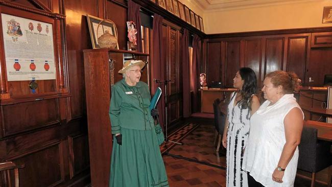 Dressed in heritage costume, volunteer Ailsa Head takes Maryborough resident Debbie Brown (right) and her visitor, Griffin University student from Sri Lanka Lakshi Senevirathna around the Heritage City on a Walking Tour. Picture: Boni Holmes