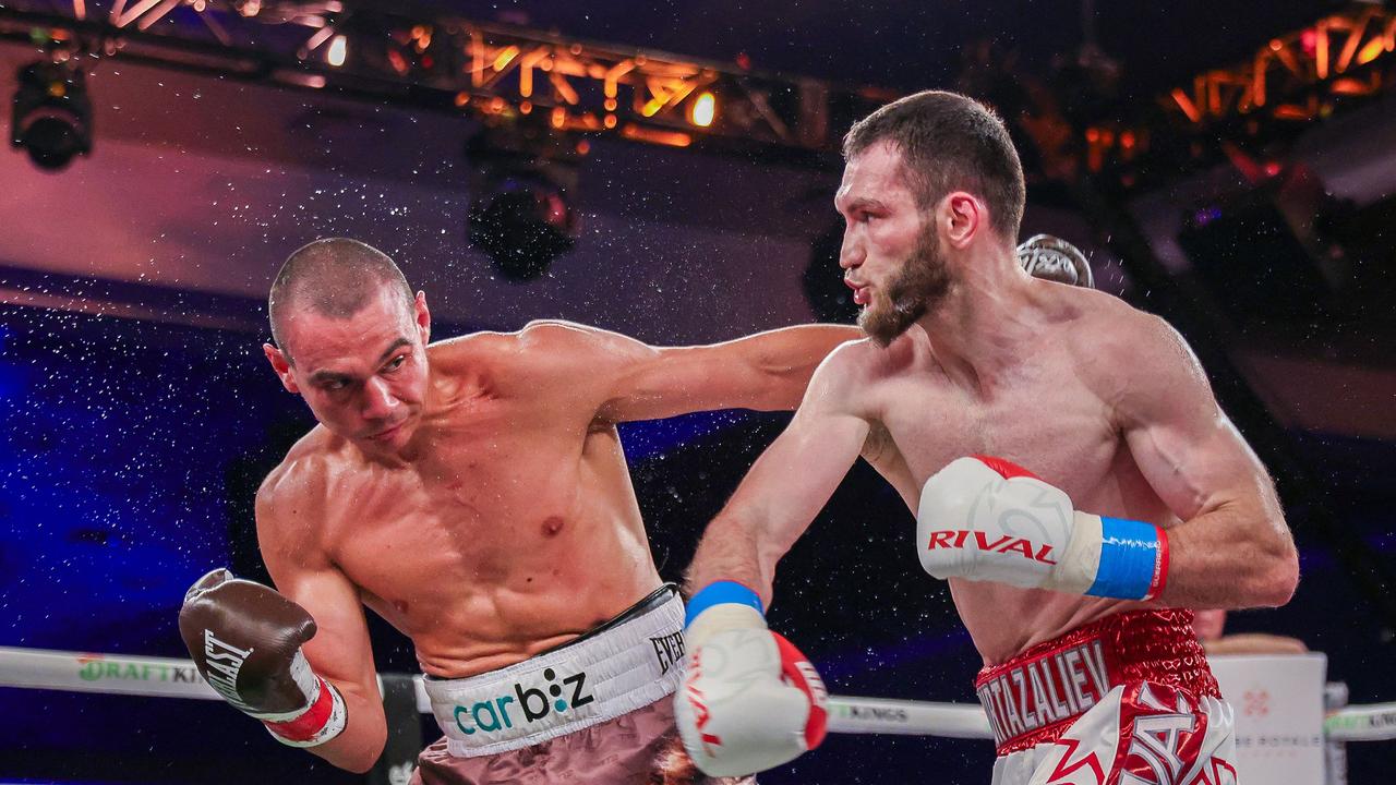 ORLANDO, FLORIDA – OCTOBER 19: Bakhram Murtazaliev punches Tim Tszyu at Caribe Royale Orlando on October 19, 2024 in Orlando, Florida. Alex Menendez/Getty Images/AFP (Photo by Alex Menendez / GETTY IMAGES NORTH AMERICA / Getty Images via AFP)