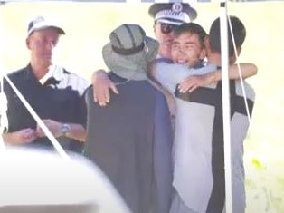 Hadi Nazar hugging friends after he was found alive in dense NSW bushland in the Kosciuszko National Park. Picture: ABC