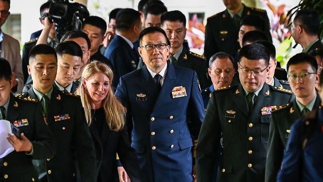 China’s Defence Minister Dong Jun walks out after a bilateral meeting with US Secretary of Defence Lloyd Austin on the sidelines of the Shangri-La Dialogue summit at the Shangri-La Hotel in Singapore. Picture: AFP