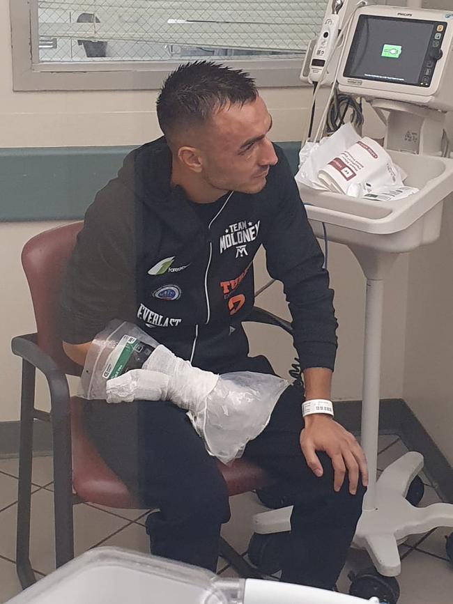 Jason Moloney in hospital with a broken hand.