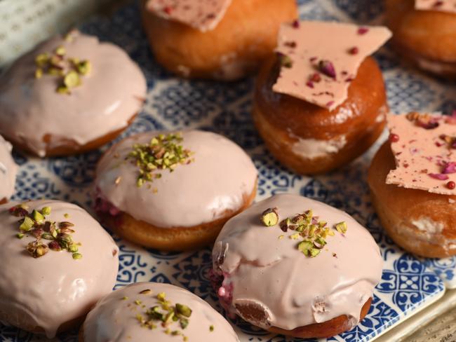 30/6/17 - COVER SHOOT FOR SOURCESA - new age doughnuts. Zainab Ayubi from Shirni Parwana with doughnuts at Plant 4 in Bowden. Photo Naomi Jellicoe