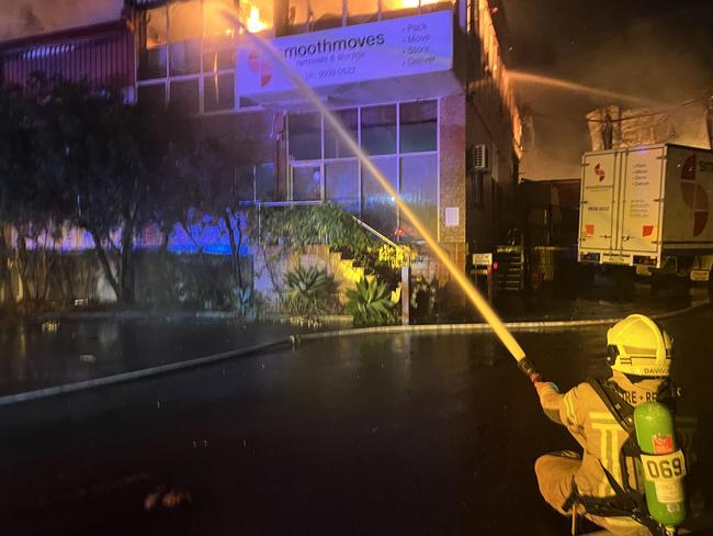 A large blaze has engulfed a factory complex in Old Pittwater Rd, within the Brookvale industrial estate. Picture: Fire and Rescue NSW