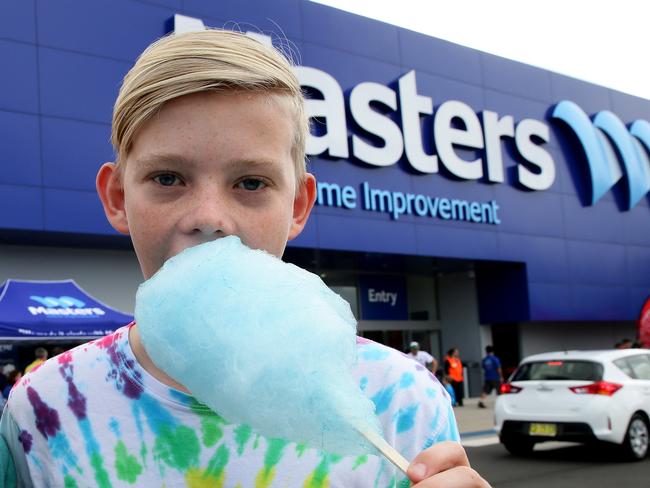 Grand opening of Masters store at Rouse Hill.Lizie Ashley and brother Dominic enjoy the fairy floss