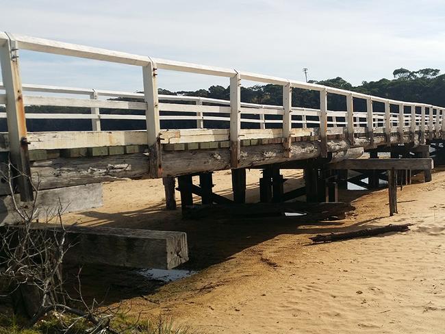 Fears for homes as historic bridge battered by storms